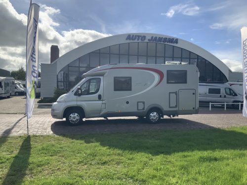 B&uuml;rstner Travel Van 2.3 MultiJ. 130 HP Semi-integrated. Engine air-conditioning, Garage, 2 single beds, Length 6.70 m., etc. Year of manufacture 2013 Camper centrum on the road photo: 39