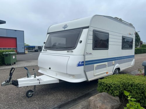 Hobby De Luxe 400 SF | Awning | Bike rack | Mover Semi Automatic | Fixed bed | Dinette (Train seat) | Tempo 100 | Shock absorbers photo: 2