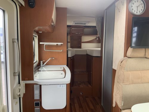 Hymer Exsis-I 674 EX 2.3 MultiJet 160 HP, A-class, Motor-airco, 2 Single beds, Pop-top roof bed, Garage, Towing hitch, etc, etc. Camper centrum on the road photo: 19