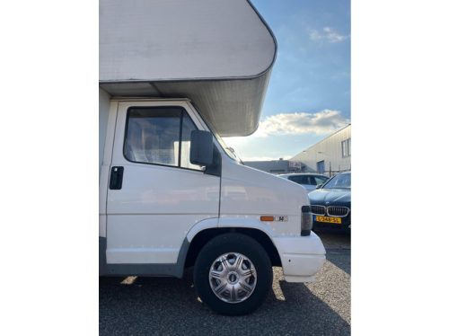 Fiat Ducato 14 2.5 Gran Volume | Goofy | Porte-v&eacute;los | Attelage | 7 Personnes | Chauffage | R&eacute;frig&eacute;rateur | Lit capucine | 2x Dinette photo: 21