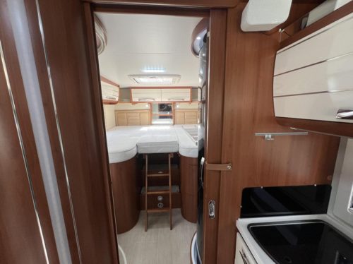 Mobilvetta KEA P65 premium class camper length and drop-down bed photo: 12