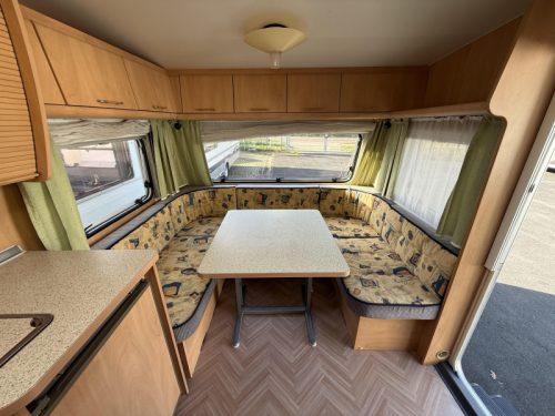 B&uuml;rstner Ventana 500 TS French bed U-shaped dinette Awning photo: 17