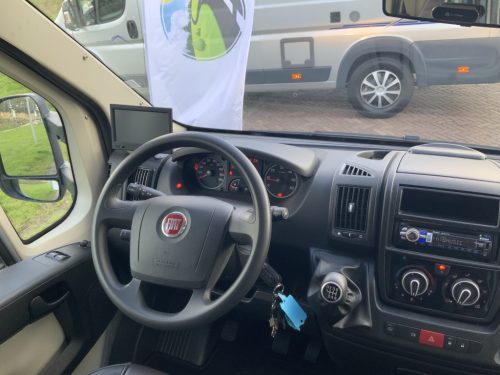 B&uuml;rstner Travel Van 2.3 MultiJ. 130 HP Semi-integrated. Engine air conditioning, Garage, 2 single beds, Length 6.70 m., etc. Year of manufacture 2013 Motorhome center on the road photo: 18