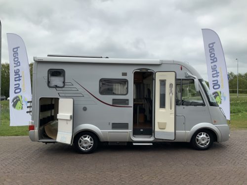 Hymer B 504 SL A-class, Equipped with 1 pers. bed at the rear and a pop-top roof bed at the front, Engine air conditioning, Alko chassis etc, Year of manufacture 2009 Camper centrum on the road photo: 36
