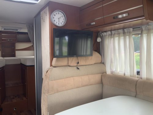 Hymer Exsis-I 674 EX 2.3 MultiJet 160 HP, A-class, Motor-airco, 2 Single beds, Pop-top roof bed, Garage, Towing hitch, etc, etc. Camper centrum on the road photo: 6