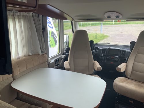 Hymer Exsis-I 674 EX 2.3 MultiJet 160 HP, A-class, Motor-airco, 2 Single beds, Pop-top roof bed, Garage, Towing hitch, etc, etc. Camper centrum on the road photo: 5