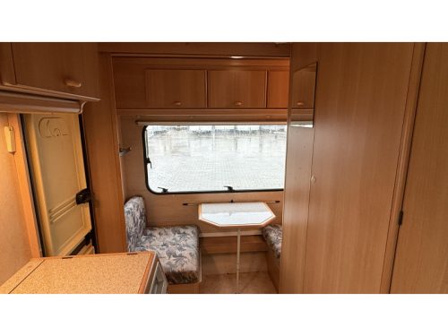 Adria Optima 425 TK 2x seating group fixed toilet photo: 1